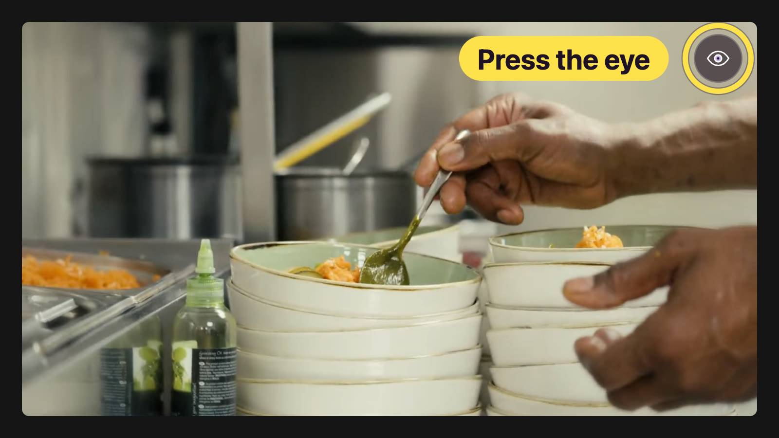 A video playing, with the Blink eye button in its top right corner, circled