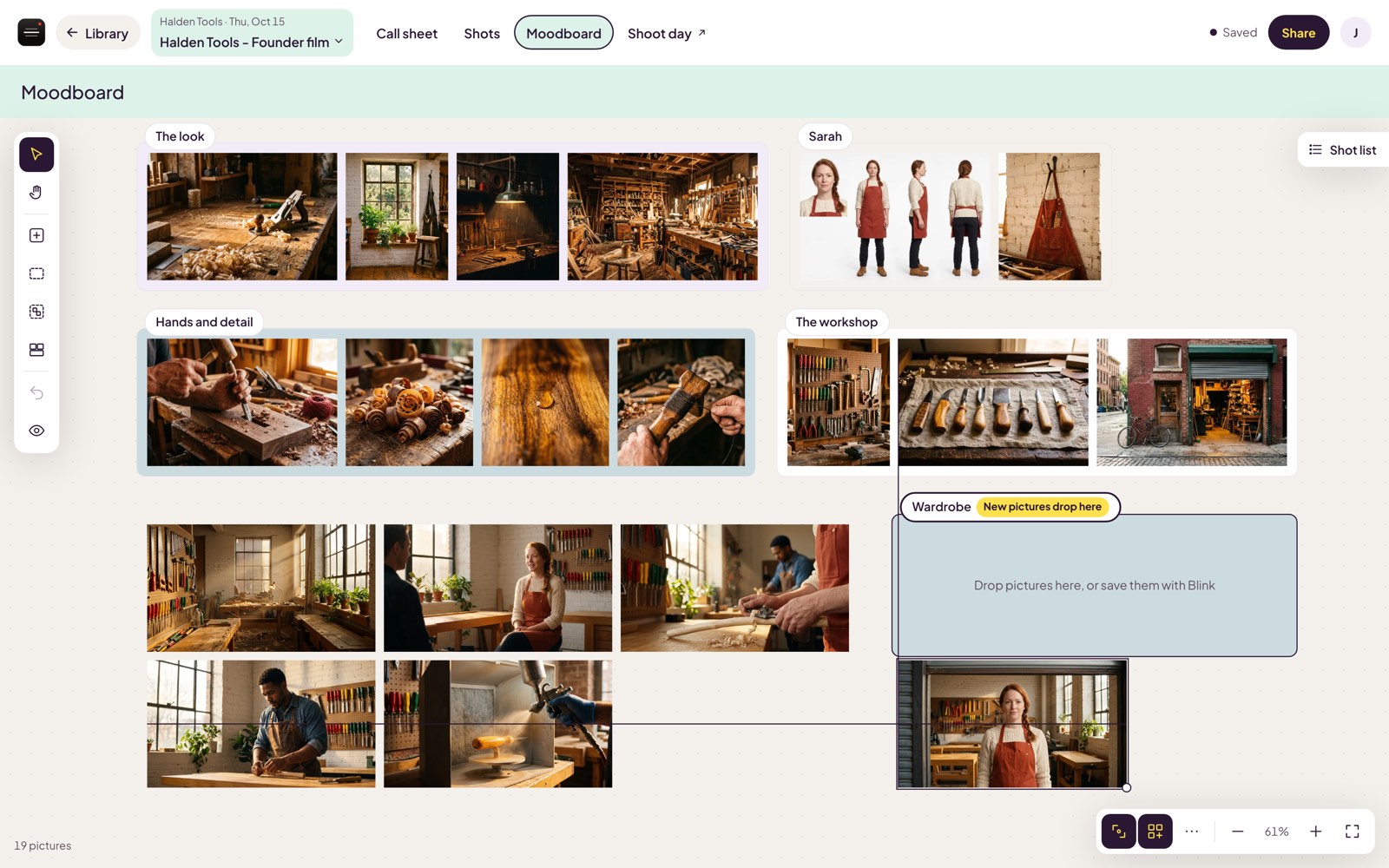 A portrait being dragged across the moodboard, with thin guide lines showing where it lines up with the picture above and the row beside it
